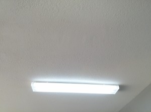 4' Florescent light fixtures were installed in this garage to brighten it up